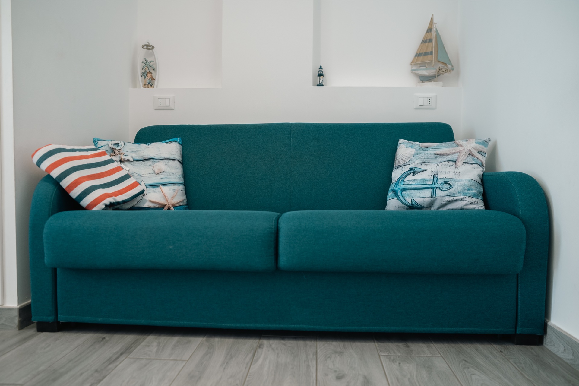 Casa Asia, divano letto del soggiorno
